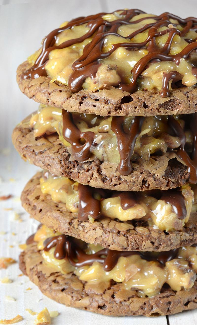 German Chocolate Brownie Cookies are soft and chewy brownie cookies topped with gooey coconut pecan caramel frosting drizzled with chocolate!
