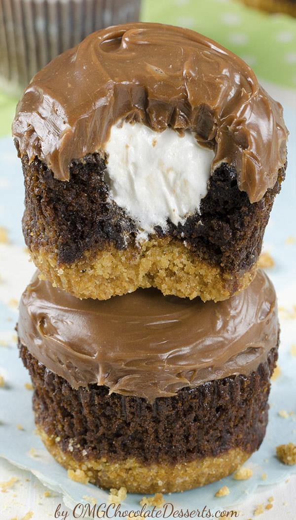 Hershey’s S’mores Cupcakes - delicious chocolate cupcakes with a graham cracker crust, filled with light and fluffy marshmallow filling and topped with milk chocolate ganache.