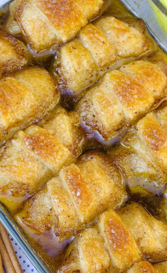 Apples wrapped in a homemade dough and baked in a cinnamon-sugar syrup. The best way to eat an apple!