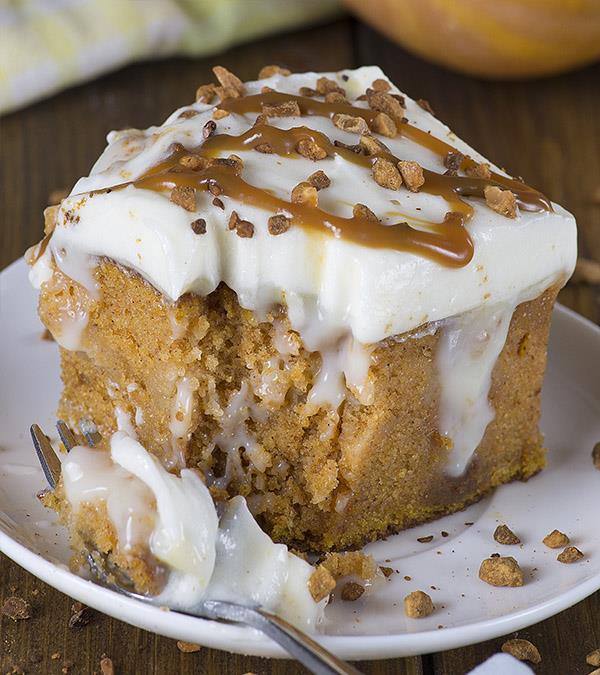 Pumpkin Poke Cake - If you love classic pumpkin cake with cream cheese frosting, then you will surely love this upgraded version of the unbelievably moist Pumpkin cake filled with homemade white chocolate pudding.
