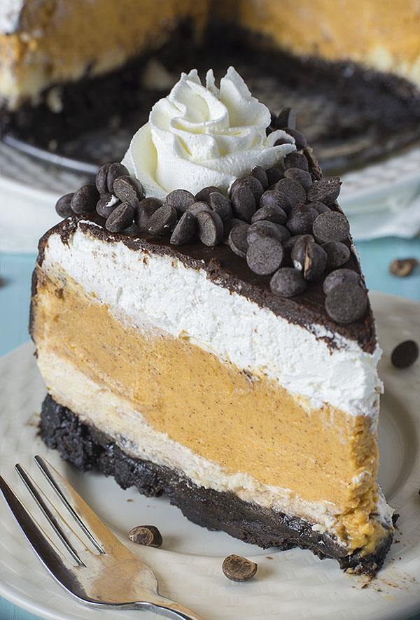 Pumpkin Cheesecake with Oreo crust, creamy cheesecake layer, spiced pumpkin cheesecake, whipped cream and chocolate ganache on top, sounds like a great alternative to pumpkin pie, especially for those cheesecake fans out there.