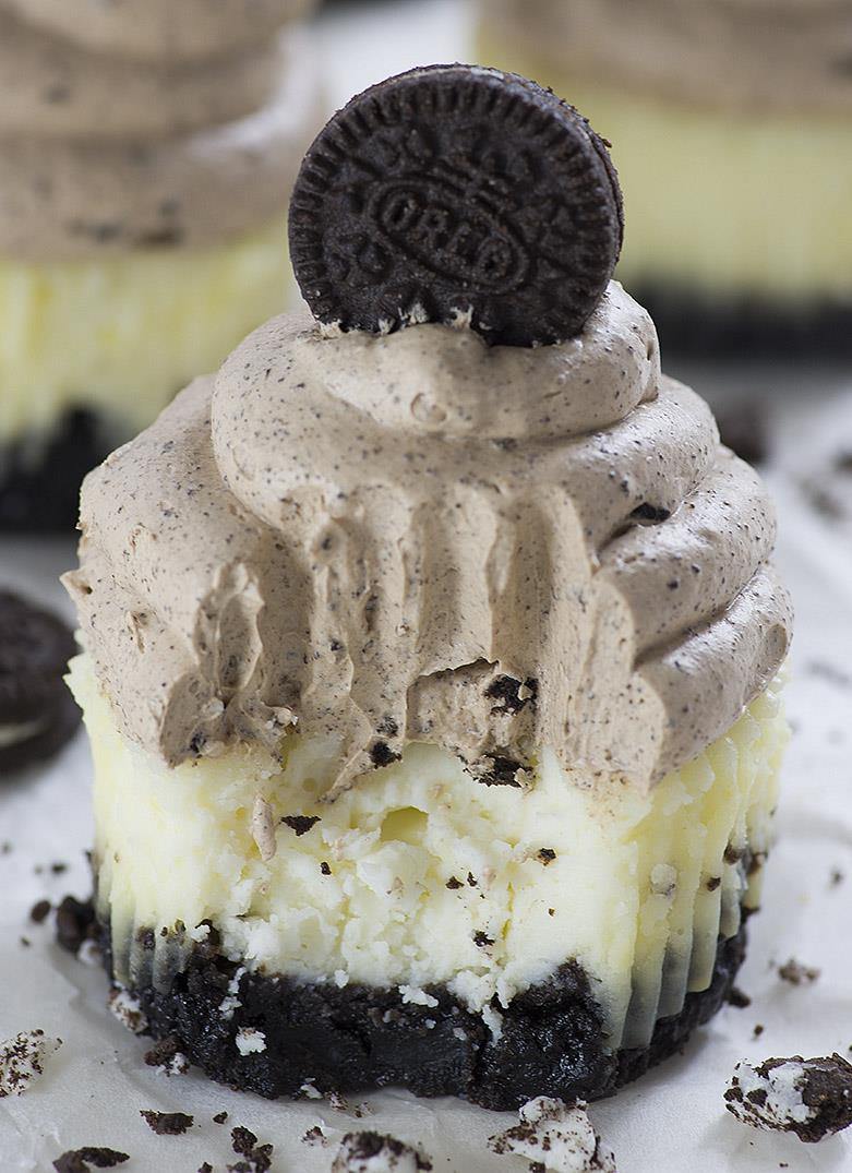 Mini Cheesecakes with thick Oreo cookie crust topped with light and creamy chocolate mousse - Chocolate Mousse Mini Oreo Cheesecakes.