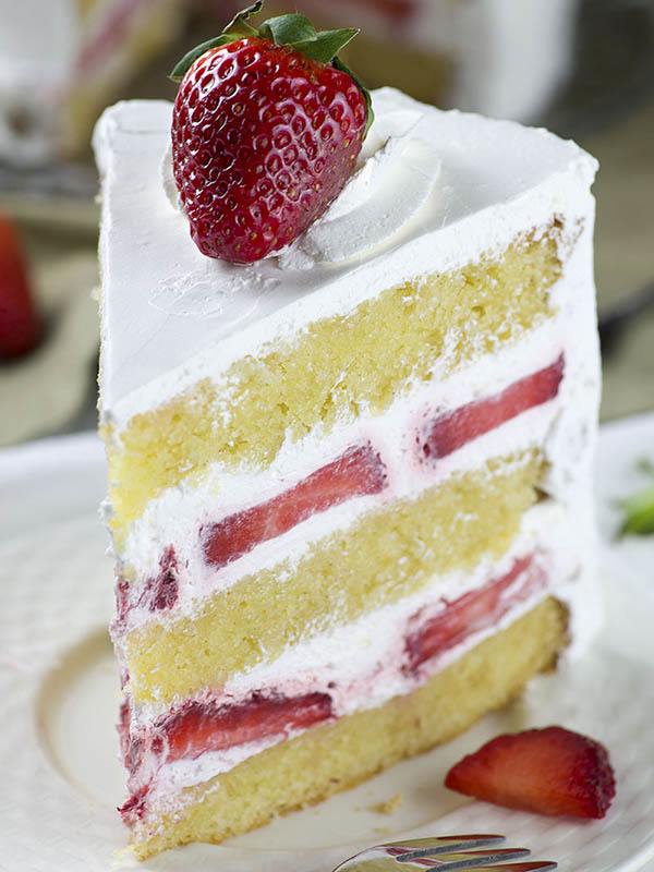 Piece of Strawberry Shortcake served on a plate.