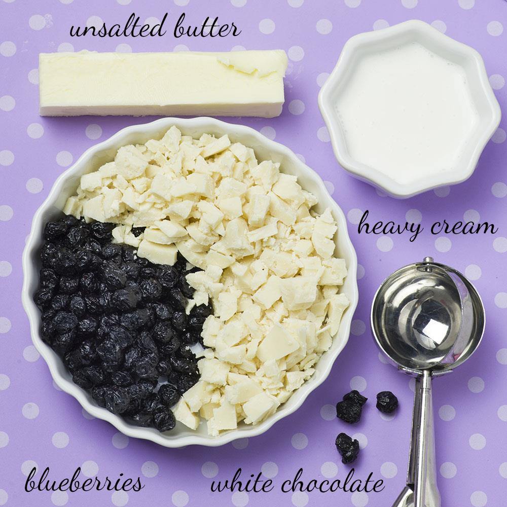 White Chocolate Blueberry Truffles - simple no bake dessert recipe with only 5 ingredients: white chocolate, butter, heavy cream and dried blueberries, roll into powdered sugar. NO ARTIFICIAL COLOR OR FLAVOR ADDED!