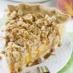 Piece of Caramel Crumble Peach Pie served on white plate.