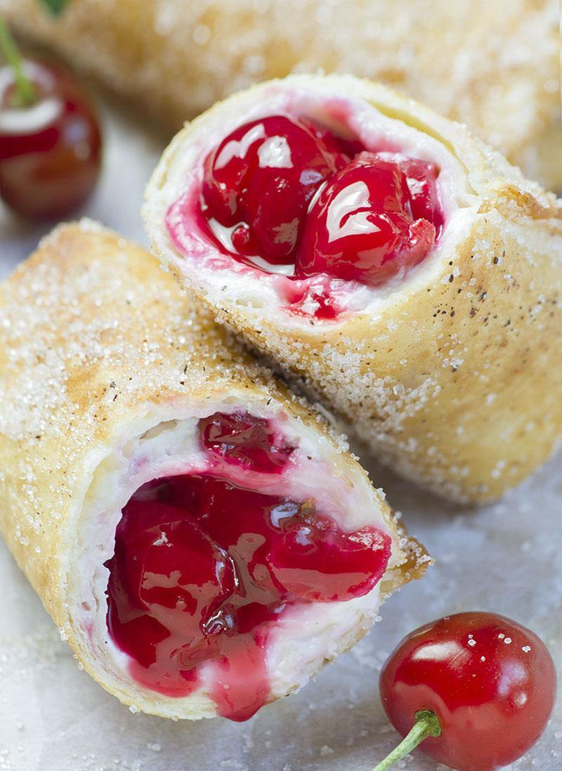 Cherry Cheesecake Chimichangas are irresistibly scrumptious, crispy, deep fried burritos filled with sweet, cherry cheesecake and rolled into cinnamon sugar.