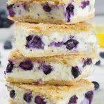 A stack of Sopapilla Blueberry Cheesecake Bars