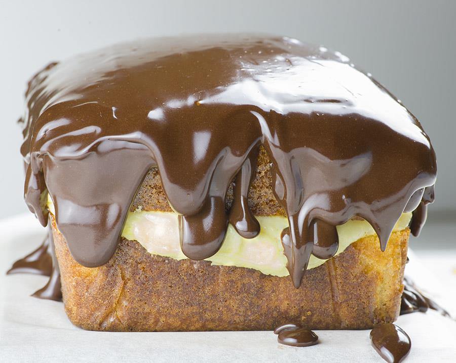 Boston Cream Pie Pound Cake - magnificent, smooth and creamy filling with vanilla flavor sandwiched between two cake layer, topped with rich chocolate ganache! Winning combo!