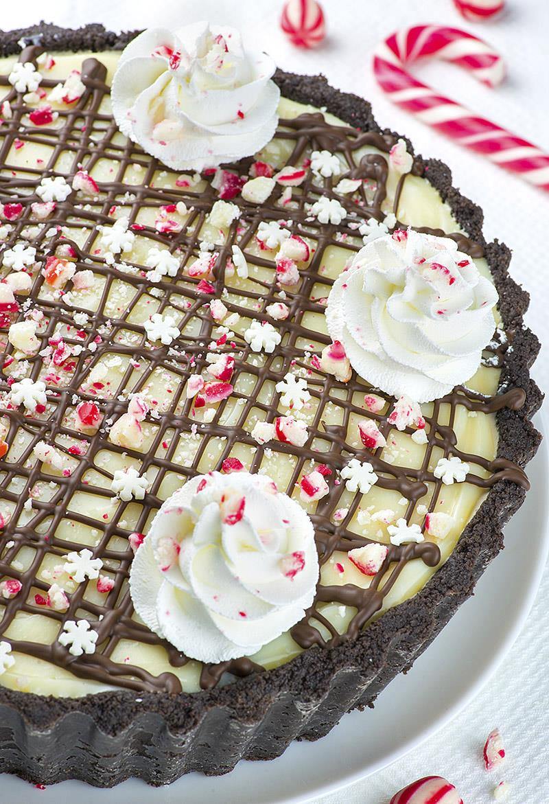 Candy Cane Pie is the only dessert recipe, you’ll need this Christmas! It’s no bake pie with crumbly Oreo crust and white chocolate ganache on top.