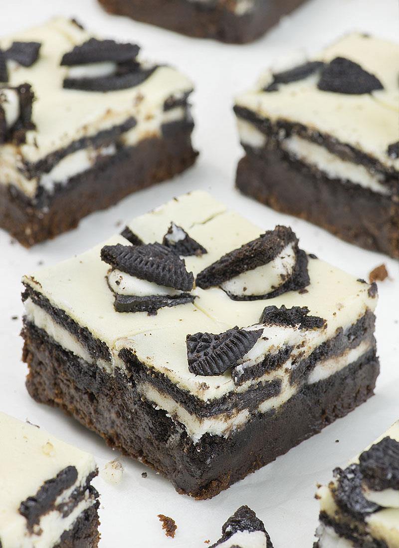 Oreo Loaded Cheesecake Brownies are rich and fudgy homemade brownies topped with layer of double stuf Oreos, cheesecake, plus more Oreo cookies on top. In other word, these could be the best brownies you’ve ever tasted!!!