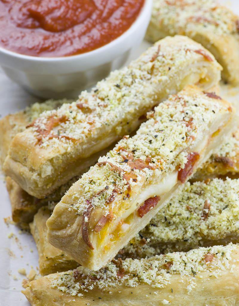 Need a last minute snack for a Game Day? Easy Cheesy Pizza Breadsticks is crowd-pleasing appetizer recipe.