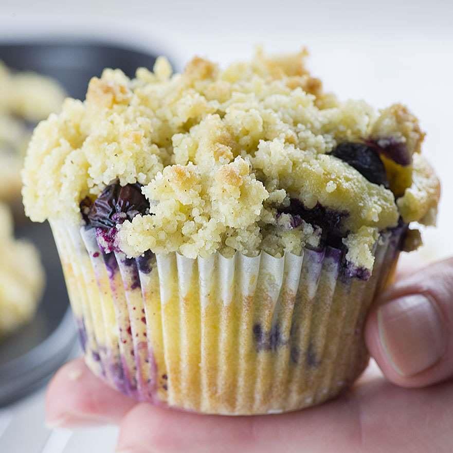 Portioning batter for Lemon Blueberry Muffins