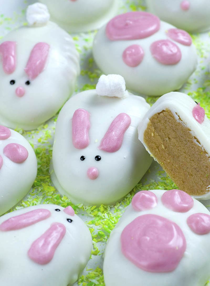 Bunch of Easter bunnies treats on green coconut 