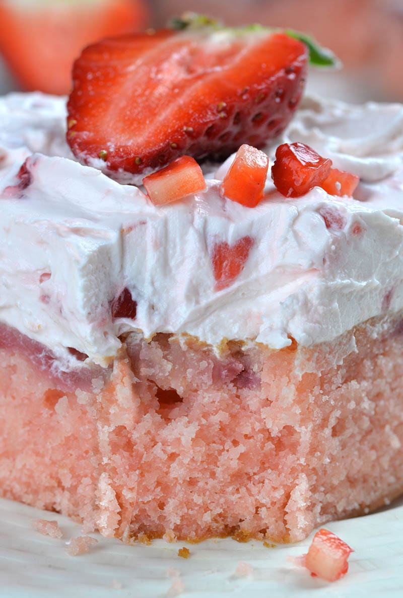 Big plan of strawberry sheet cake .