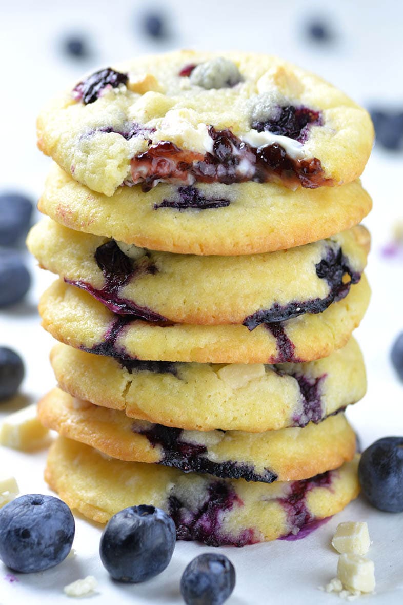 Soft and chewy Blueberry Cream Cheese Cookies with fresh blueberries, white chocolate chunks and gooey cream cheese and blueberry jam filling in the center are really the best blueberry cookies ever.