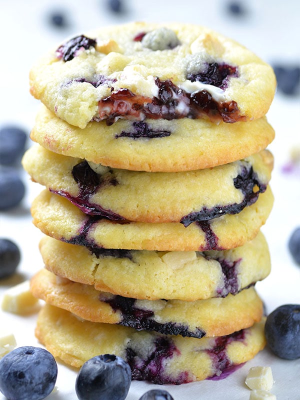 Soft and chewy Blueberry Cream Cheese Cookies with fresh blueberries, white chocolate chunks and gooey cream cheese and blueberry jam filling in the center are really the best blueberry cookies ever.