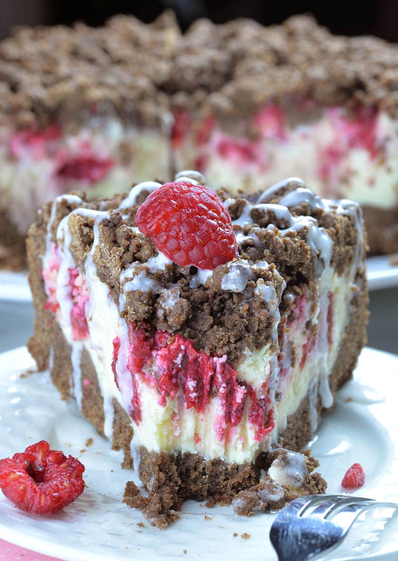 Chocolate Crumb Cake with creamy cheesecake filling and raspberries is really rich and decadent coffee cake.