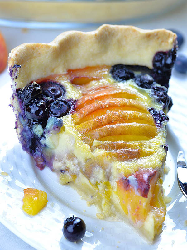 Impossible Peach Blueberry Pie-homemade buttery pie crust filled with creamy vanilla custard, fresh blueberries and sweet and juicy peaches.