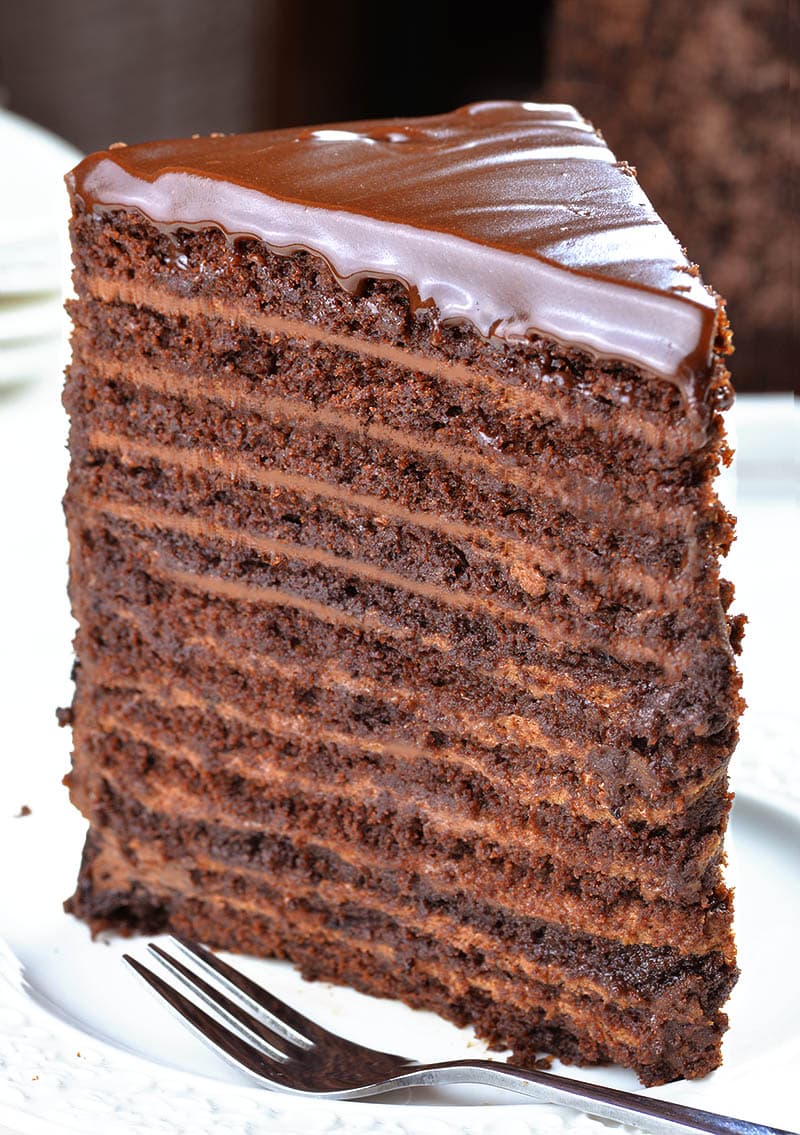 This chocolate cake with 12 layers of cake, 12 layers of filling, plus chocolate ganache on top.