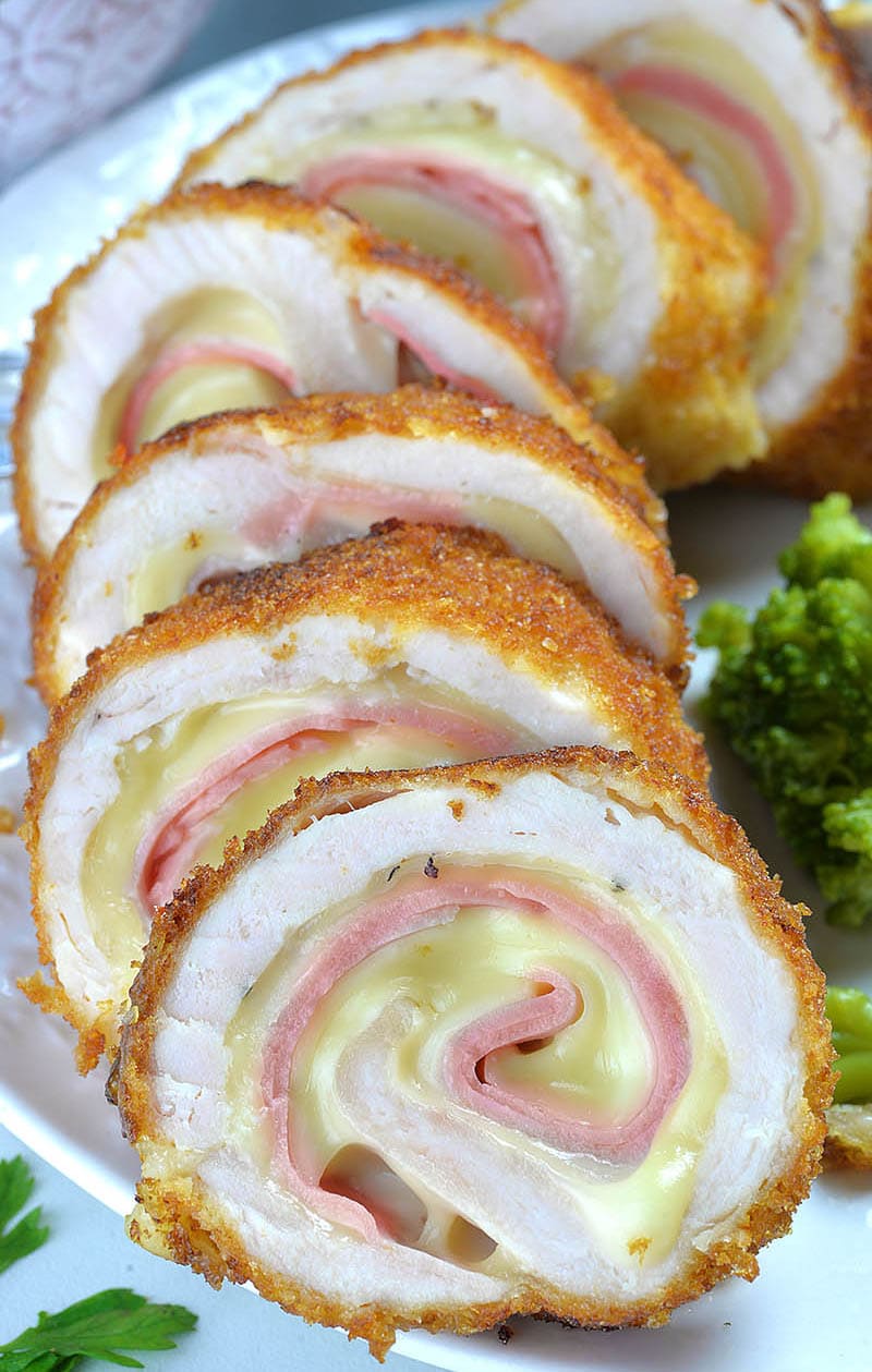 Chicken Cordon Bleu stuffed with ham and cheese, coated with crunchy golden breadcrumbs is easy to make, family favorite chicken recipe. 