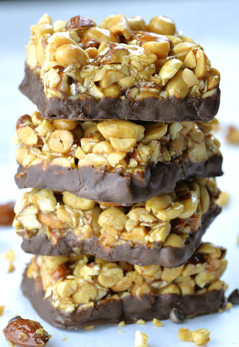 These delicious and chewy gluten free protein bars are combo of roasted almonds, roasted peanuts, whole grain rolled oats, peanut butter, honey and brown rice syrup.