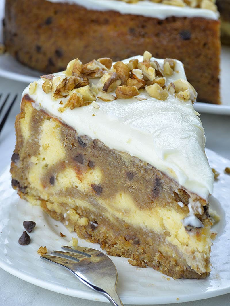 Piece of Banana Bread Cheesecake on a white plate.