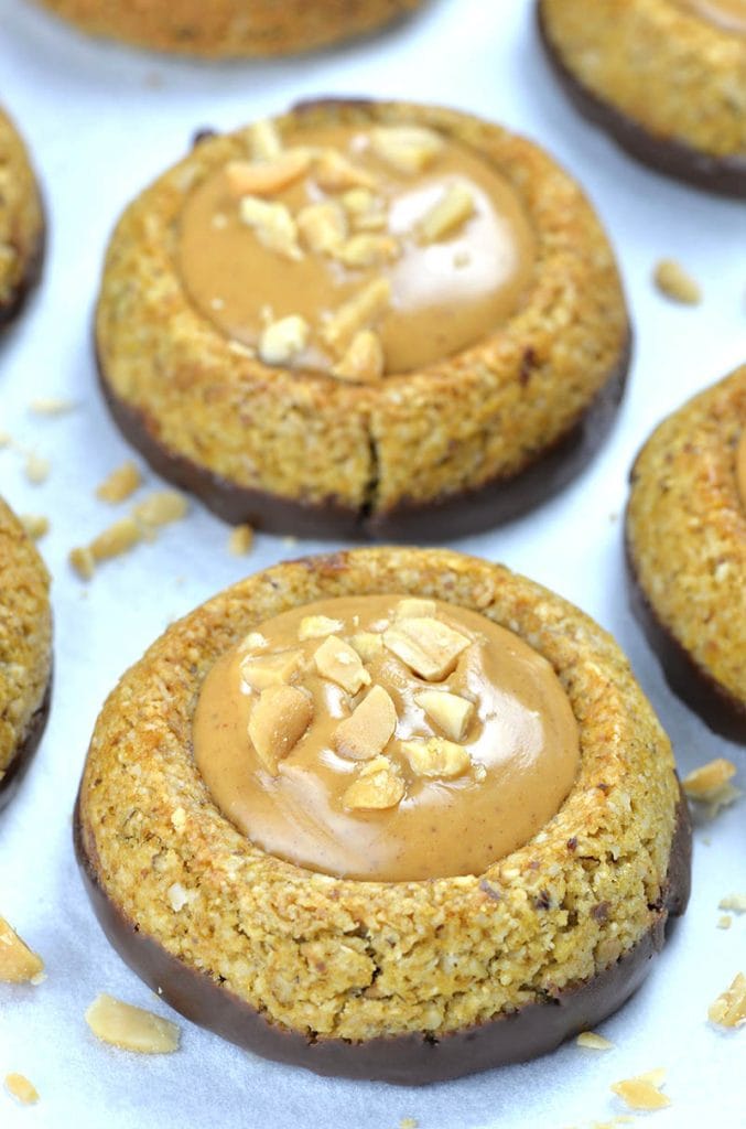 Two Chocolate Peanut Butter Granola Cookies on a white background.