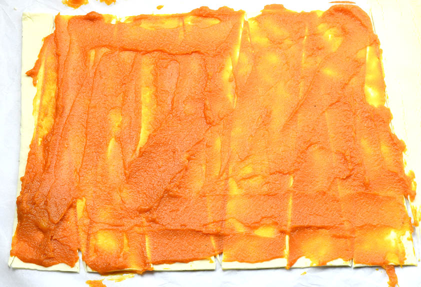 Puff pastry sheet filled with pumpkin pie filling.