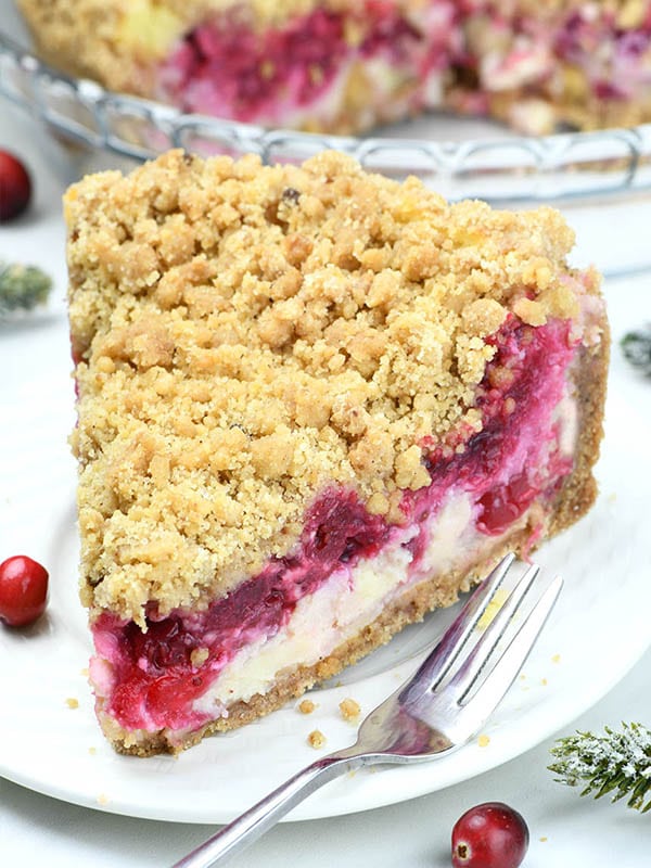 Slice of cranberry cheesecake pie on a plate