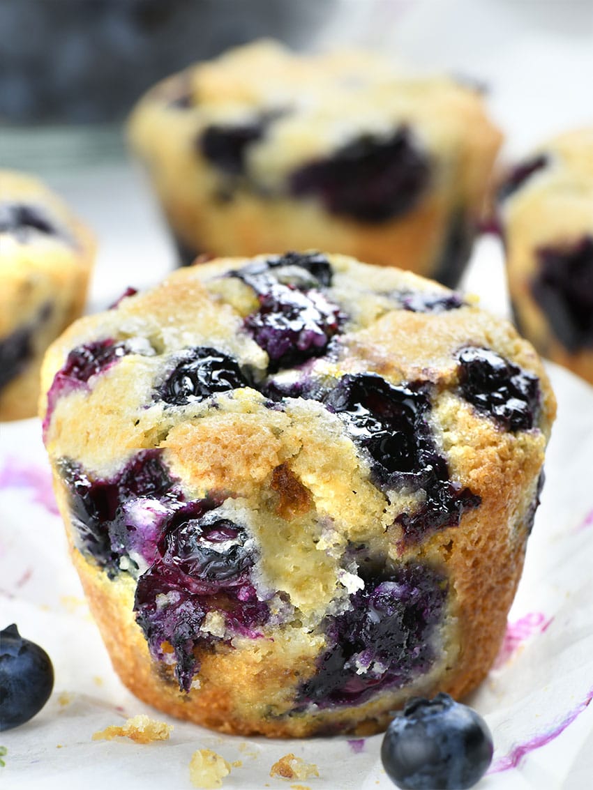 Big Blueberry Cobbler Muffins in focus.