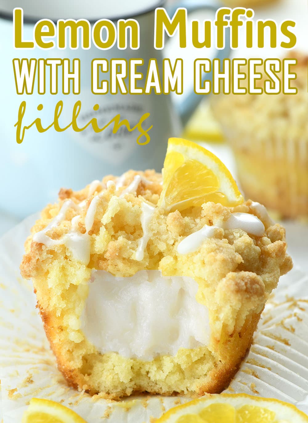 Lemon Cream Cheese Muffin topped with sugar icing , streusel crumbs and lemon on the top. 