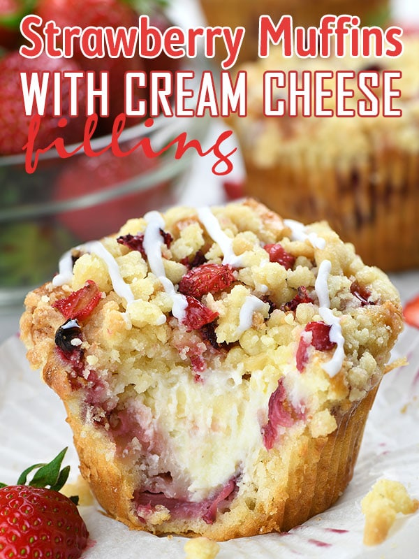 Strawberry Cream Cheese Muffins on a white paper garnished with fresh strawberry.