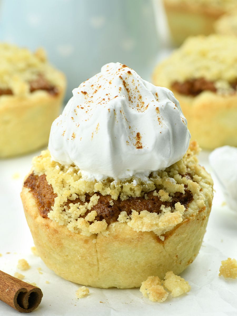 Mini Shoofly Pies  with whipped cream on top.