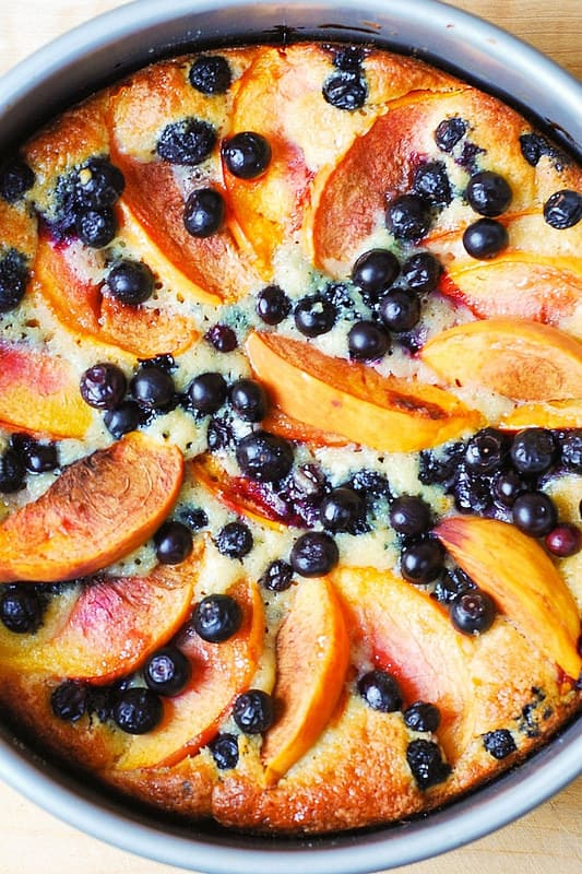 Peach and Blueberry Greek Yogurt Confection made in a springform pan - you couldn't find an easier recipe for such a colorful, trappy cake!