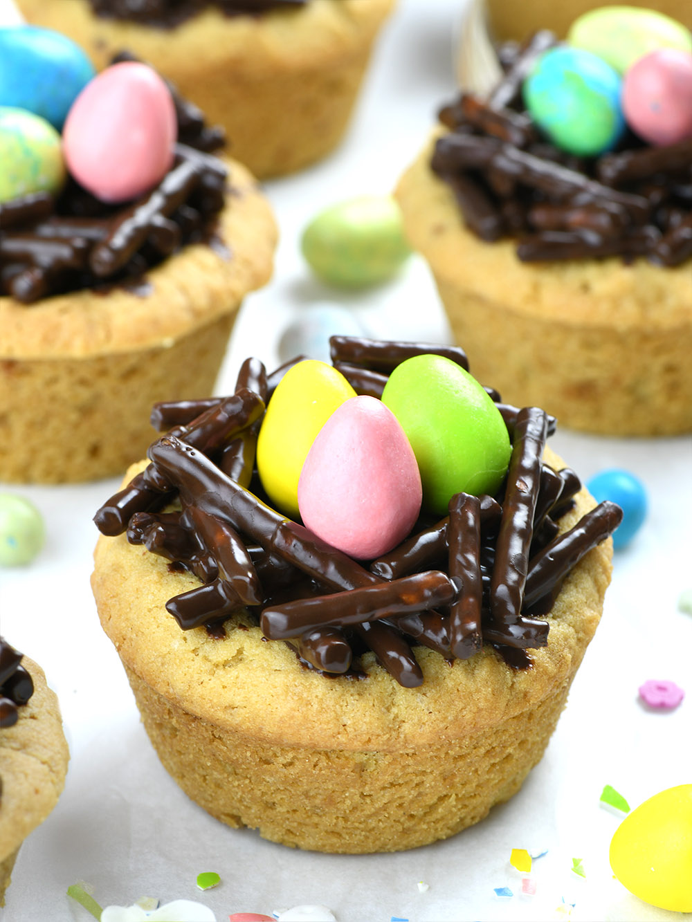 Cookie cup, filled with Nutella and Chocolate-Pretzel Nest with 3 easter eggs (candies) on the top.