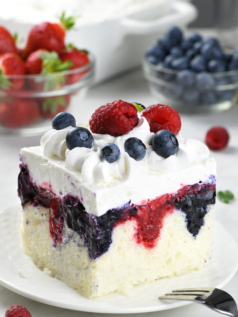 A slice of summer berry poke cake on top, in the style of light white and blue, multidimensional layers, rectangular fields, light red and dark purple