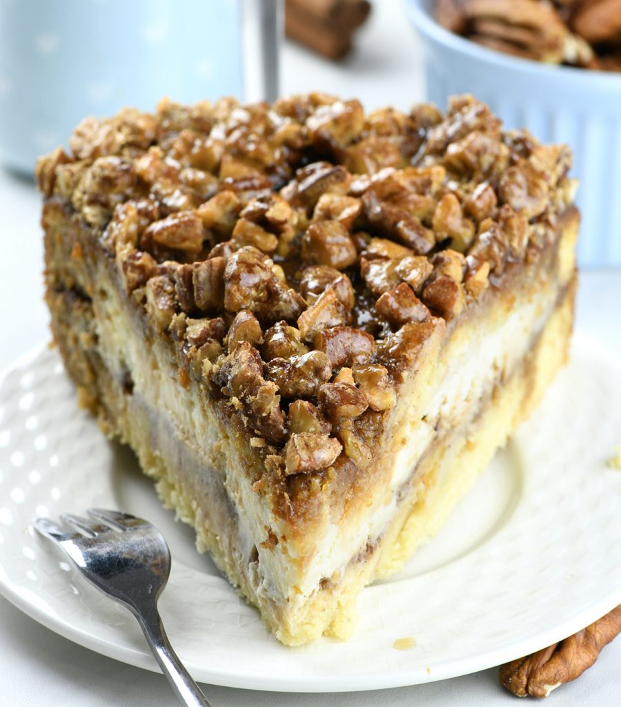 Pecan Pie Cheesecake Coffee Confection on a white plate .